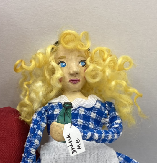 Blond doll in blue dress
