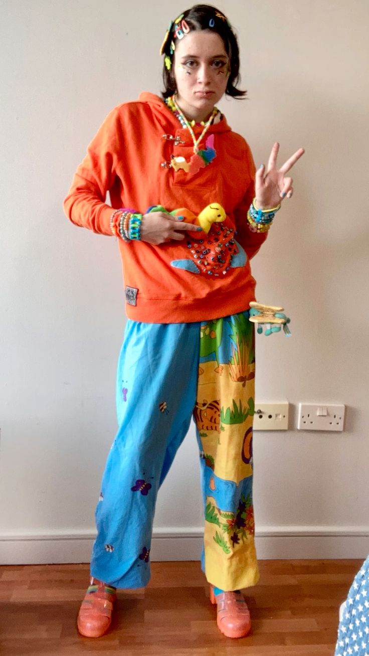 person in orange and blue outfit.