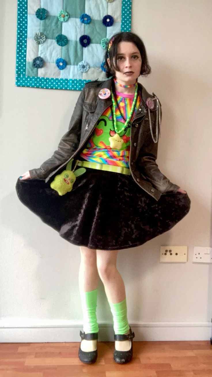 person in neon green and black outfit.