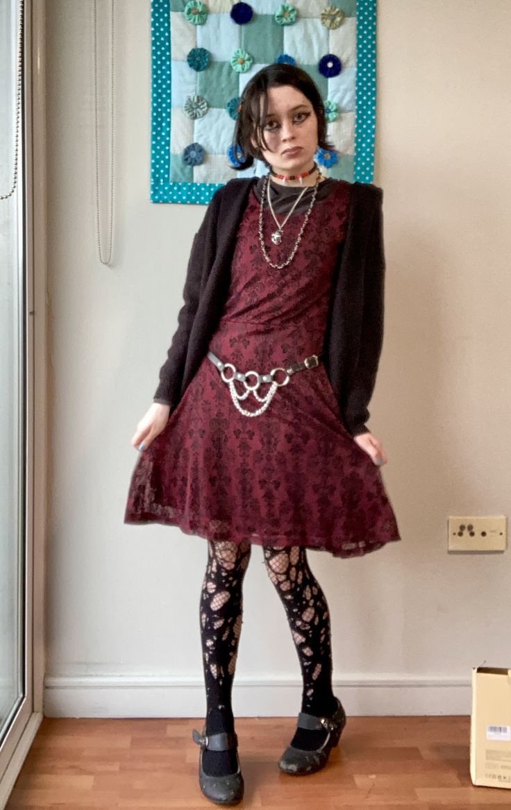 person in red velvet dress