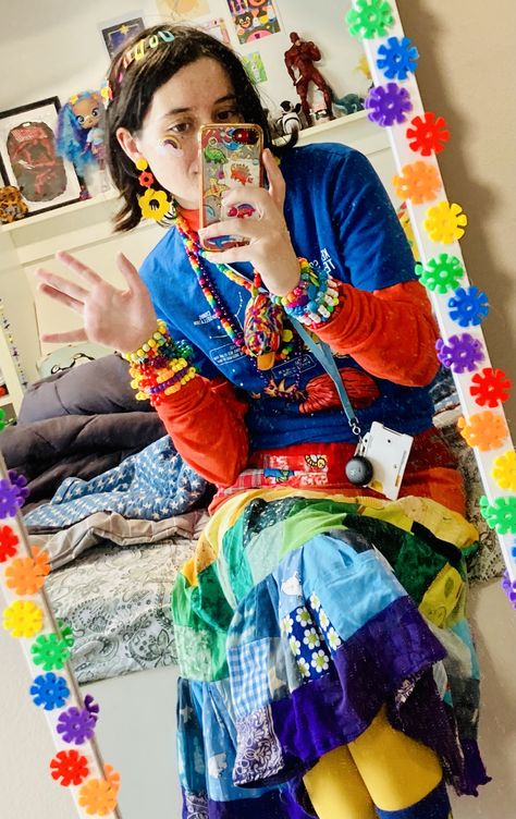 person in rainbow outfit