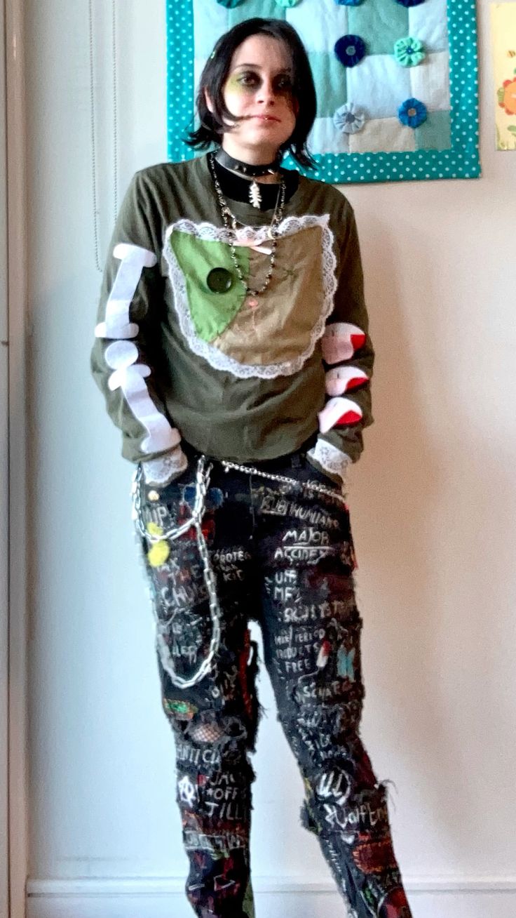 A person wearing a zombie cat shirt.