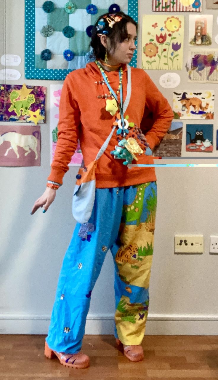 person in orange and blue outfit