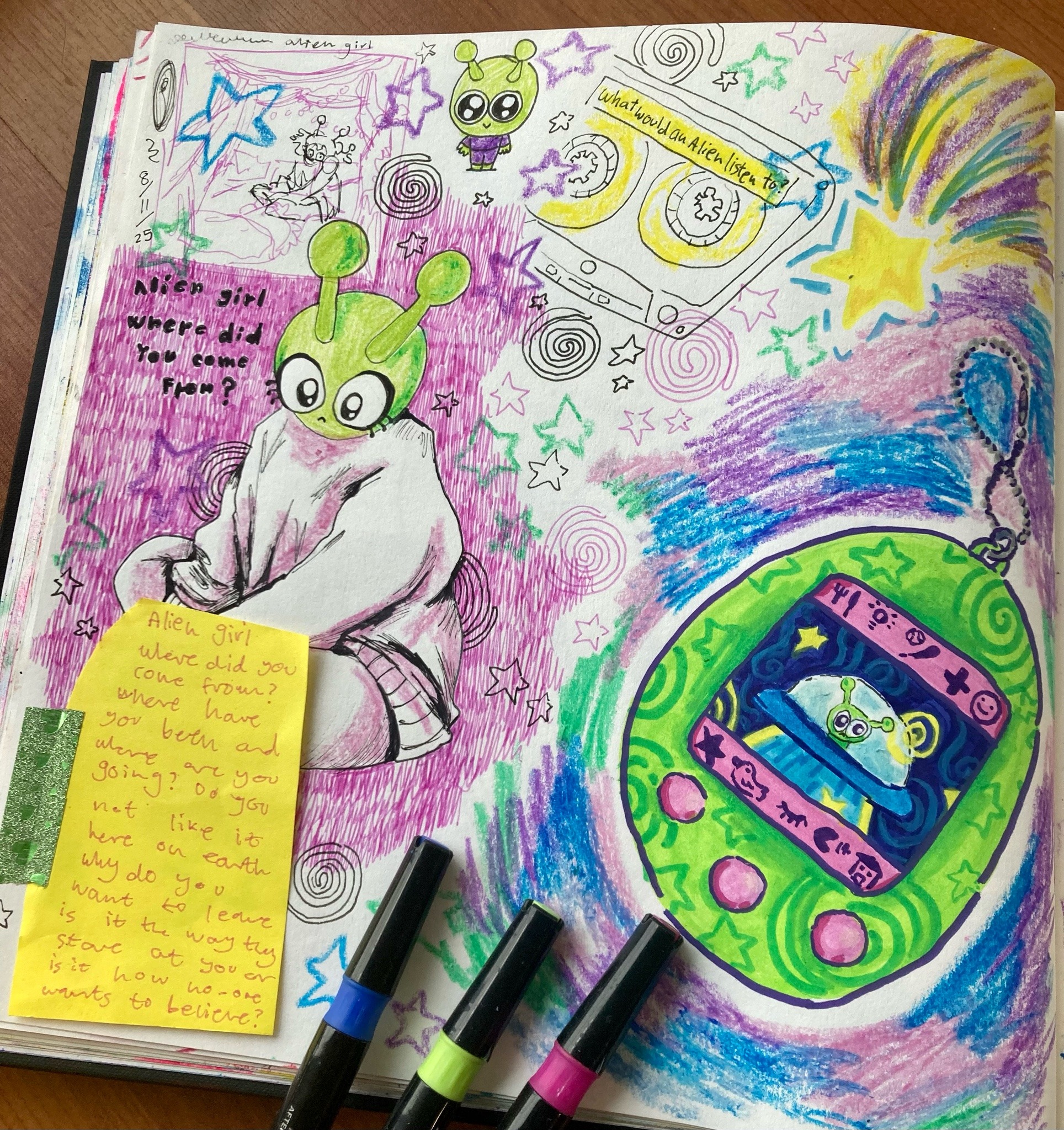 Sketch page of an alien girl and a tamagotchi.